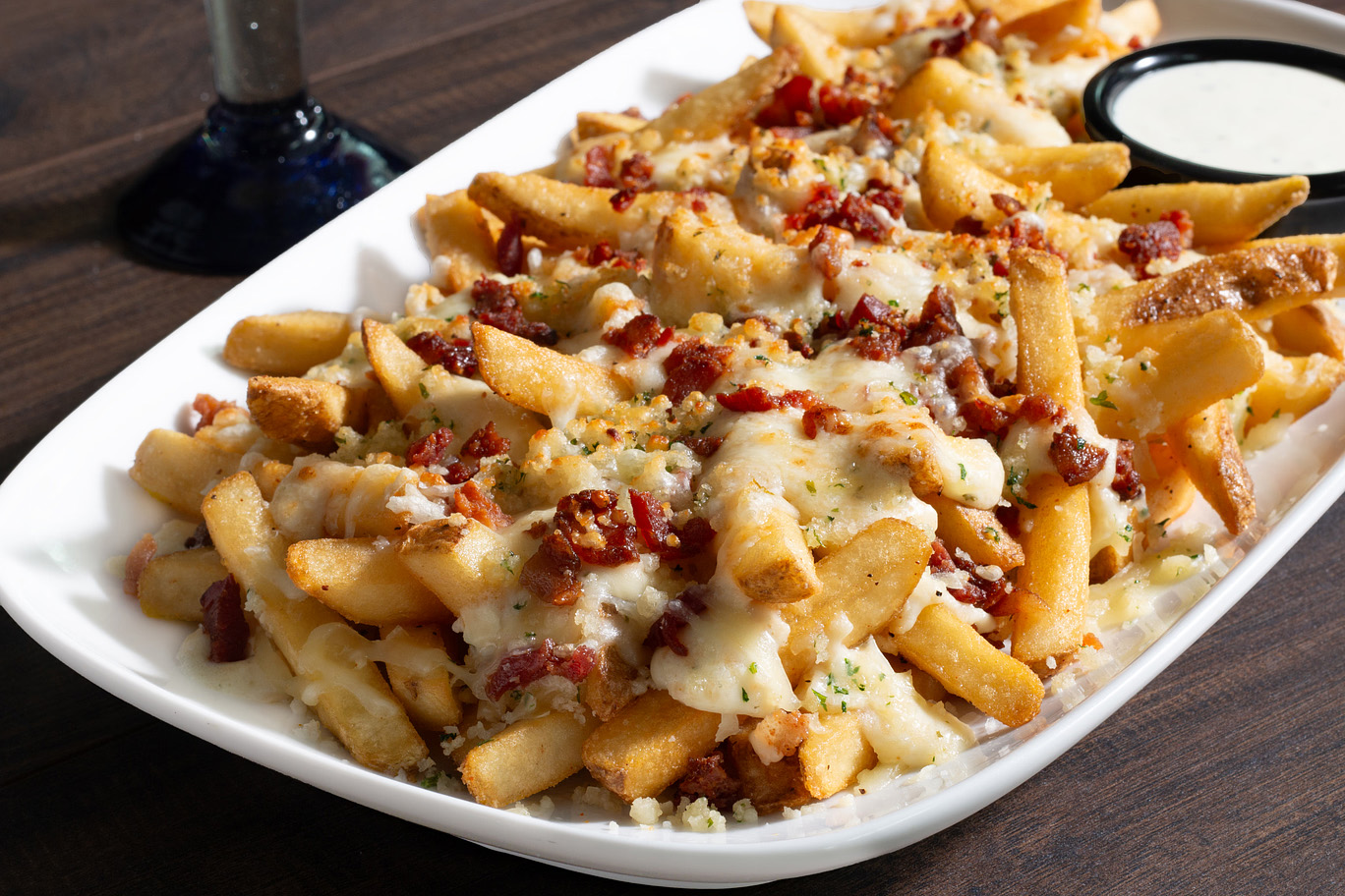 LongHorn's Parmesan Crusted Fries. Order today!
