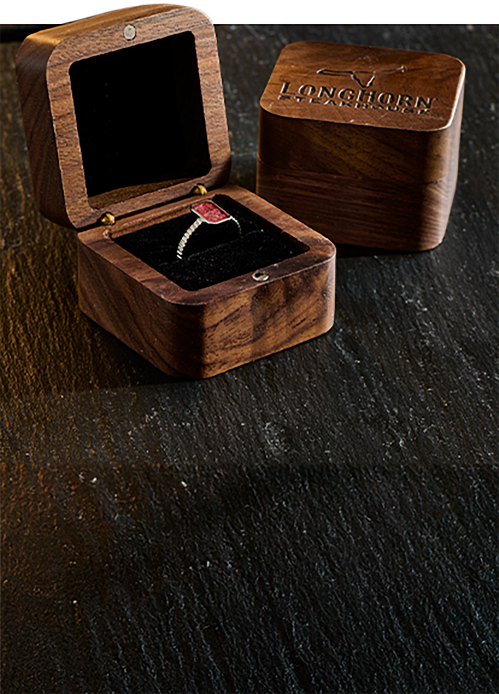 Two boxes of LongHorn Steakhouse's Steak Commitment Rings.